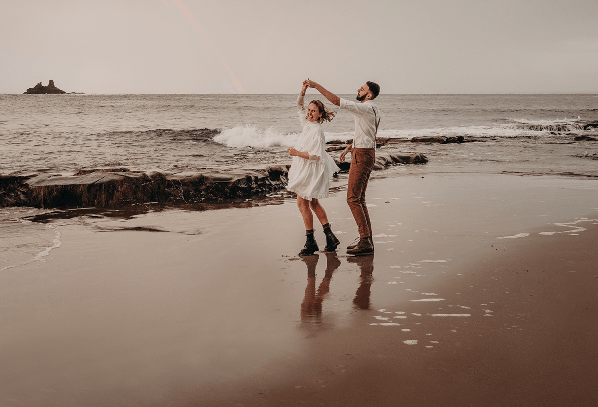 Image of rad couple, beach dance